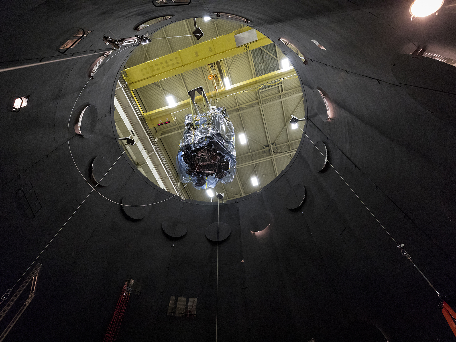 NASA’s Parker Solar Probe descends into the thermal vacuum chamber at NASA’s Goddard Space Flight Center. The spacecraft will be inside the chamber for about seven weeks. 