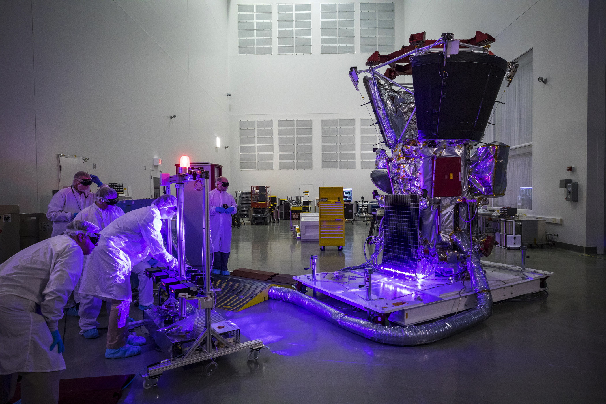 Parker Solar Probe team members use lasers to ensure that the spacecraft's solar arrays have survived harsh environmental testing and are operating correctly.