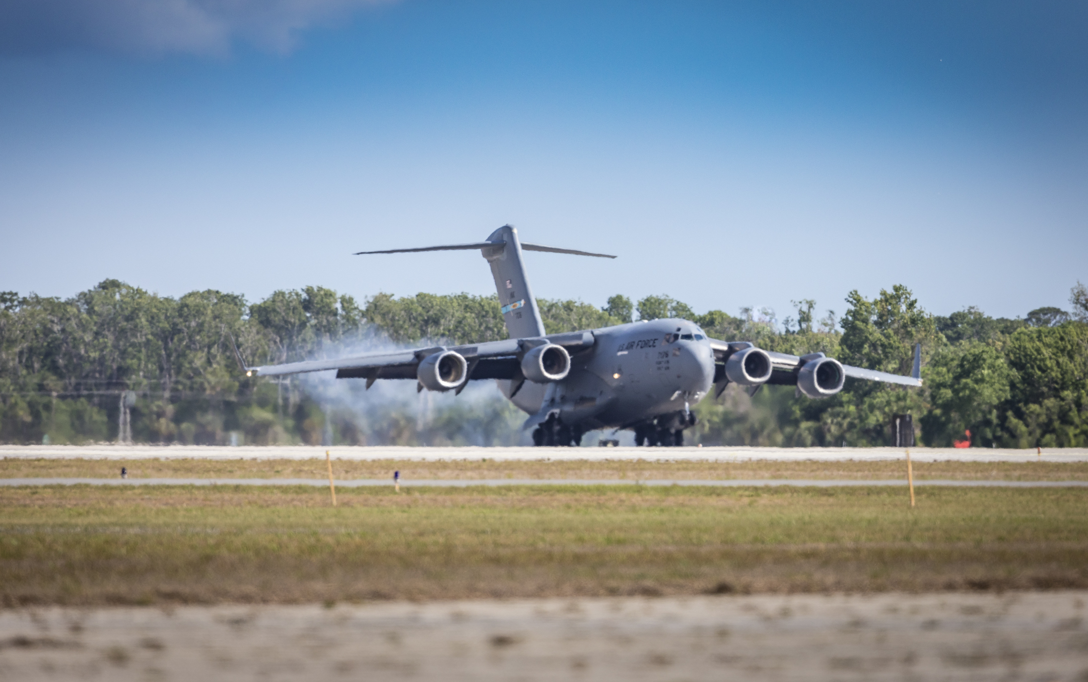 A C-17 from the United States Air Force’s 436th Airlift Wing, carrying NASA’s Parker Solar Probe, lands at 10:40 a.m. EDT at Space Coast Regional Airport in Titusville, Florida, on the morning of April 3, 2018. After landing, the spacecraft was unloaded and taken to Astrotech Space Operations, also in Titusville, for pre-launch testing and preparations. 
