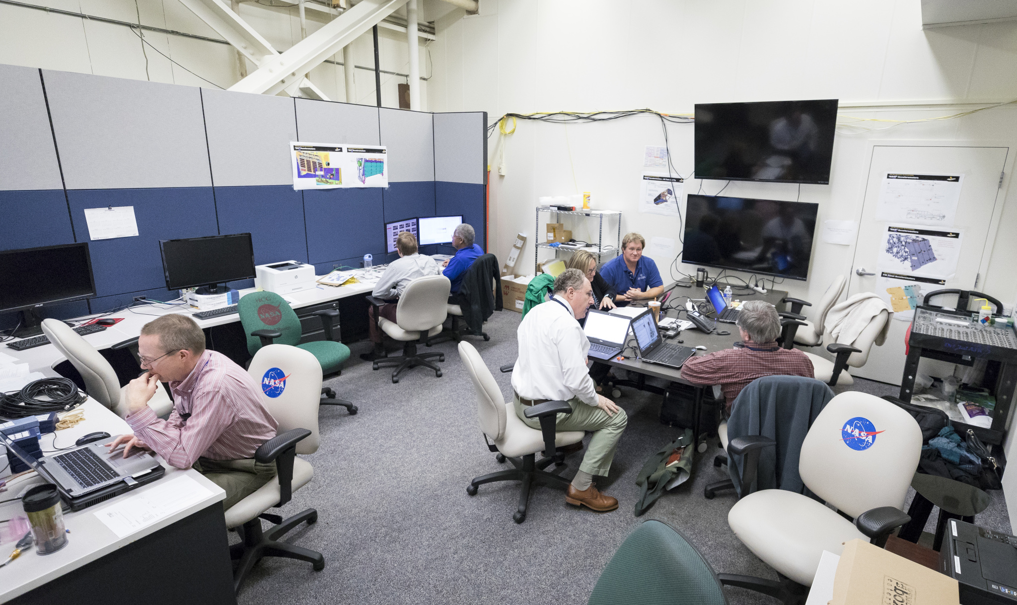 Members of the integration and testing team monitor acoustic testing of Parker Solar Probe in the Acoustic Test Chamber at NASA’s Goddard Space Flight Center in Greenbelt, Maryland. 