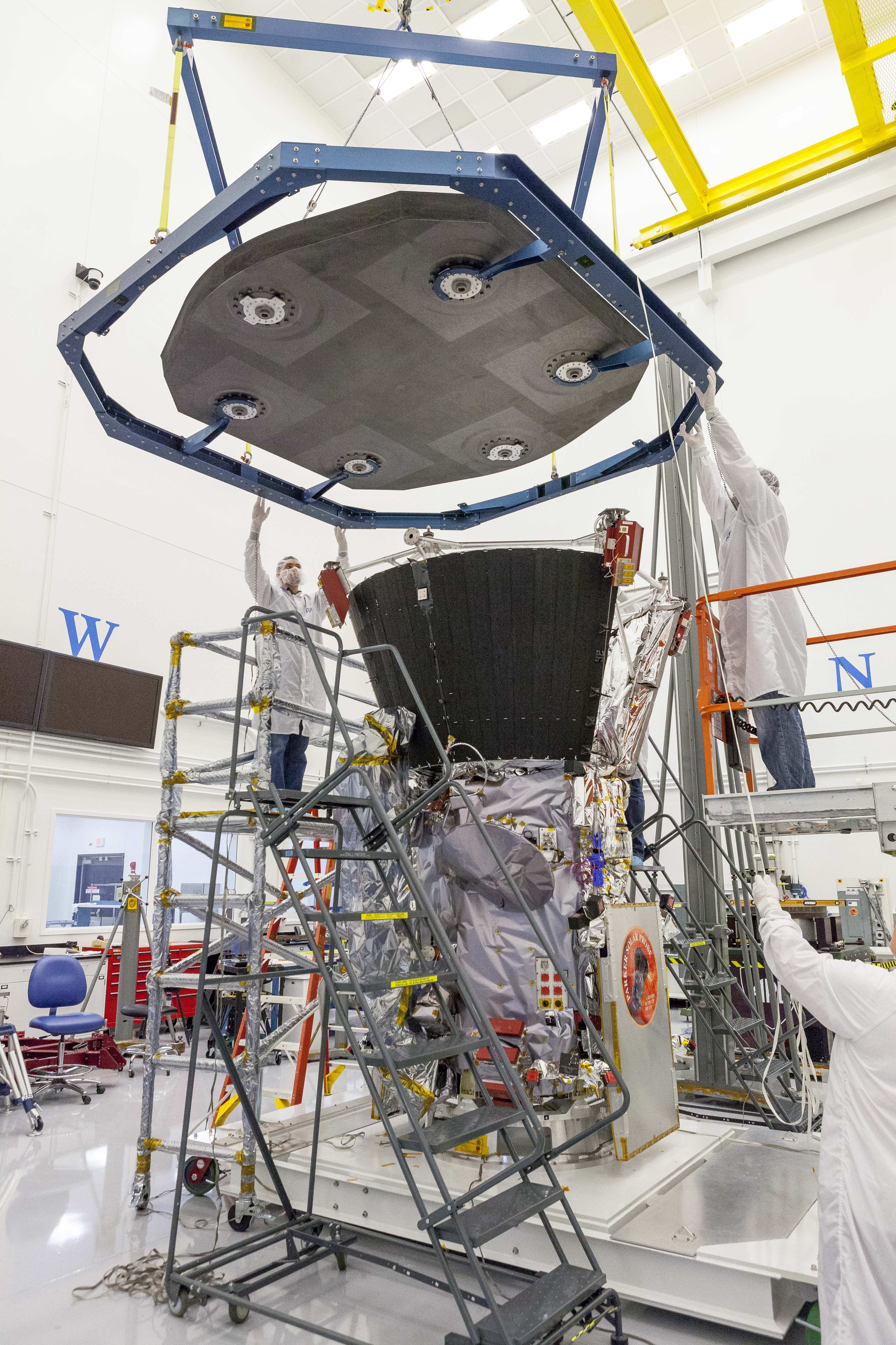 On Sept. 21, 2017, engineers at the Johns Hopkins University Applied Physics Laboratory in Laurel, Maryland, lowered the thermal protection system – the heat shield – onto the spacecraft for a test of alignment as part of integration and testing. 