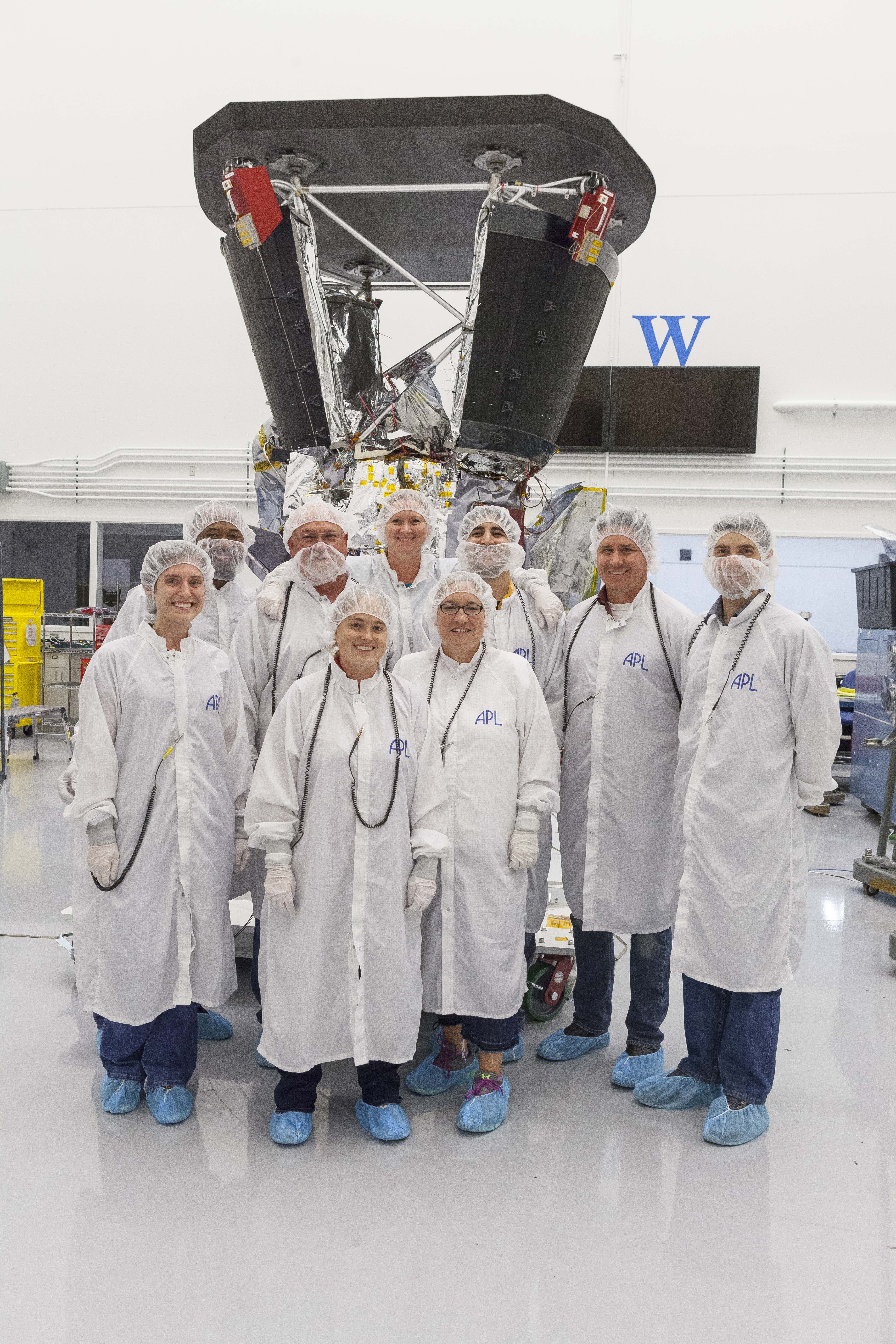 The TPS installation team from the Johns Hopkins University Applied Physics Laboratory in Laurel, Maryland,which installed the thermal protection system – the heat shield – onto the spacecraft for a test of alignment as part of integration and testing. 