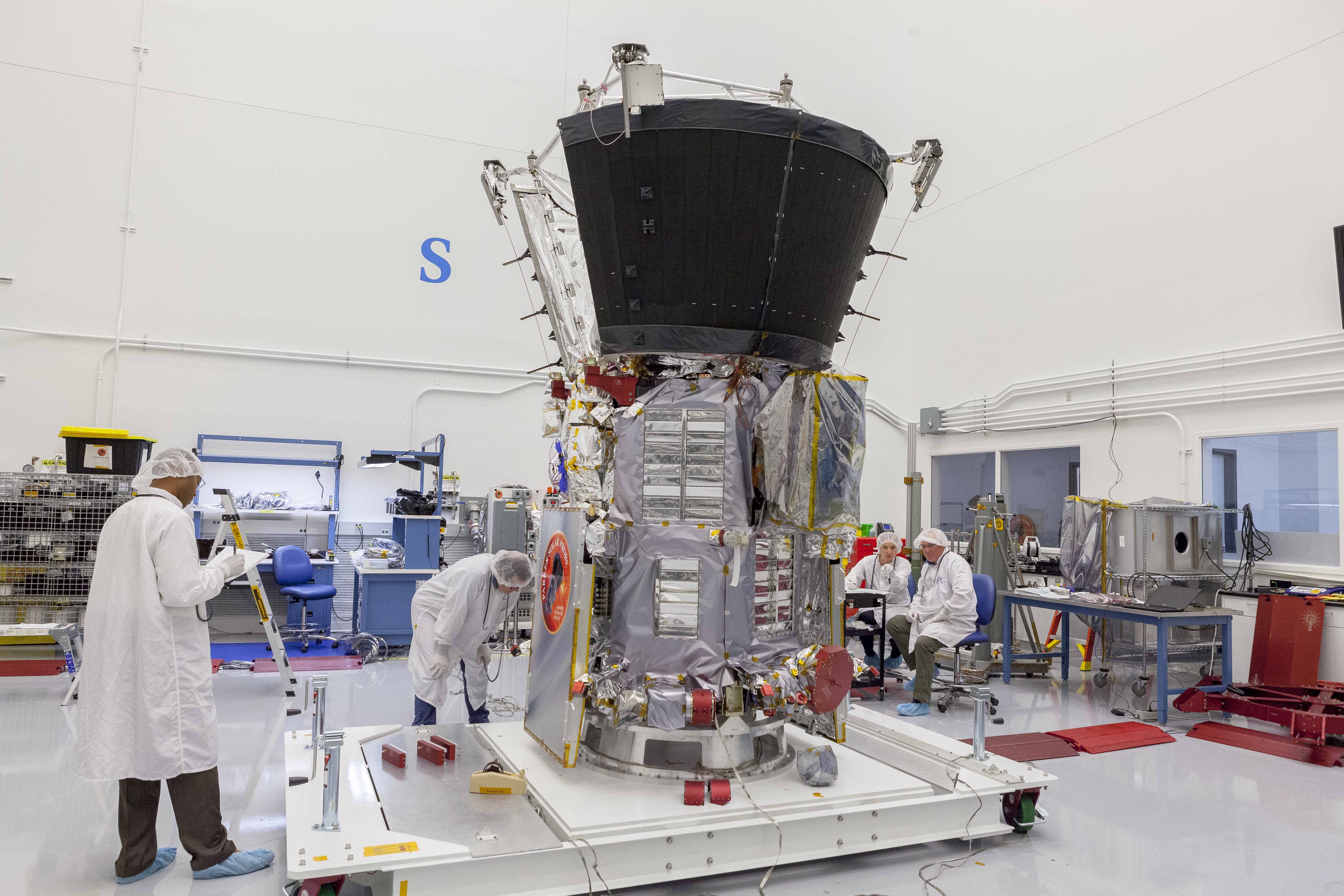 Engineers and technicians prepare the Parker Solar Probe spacecraft for mass properties testing. This marks the beginning of environmental testing, a series of physical tests that will ensure the probe can withstand the rigors of launch and temperature fluctuations of space operations. 