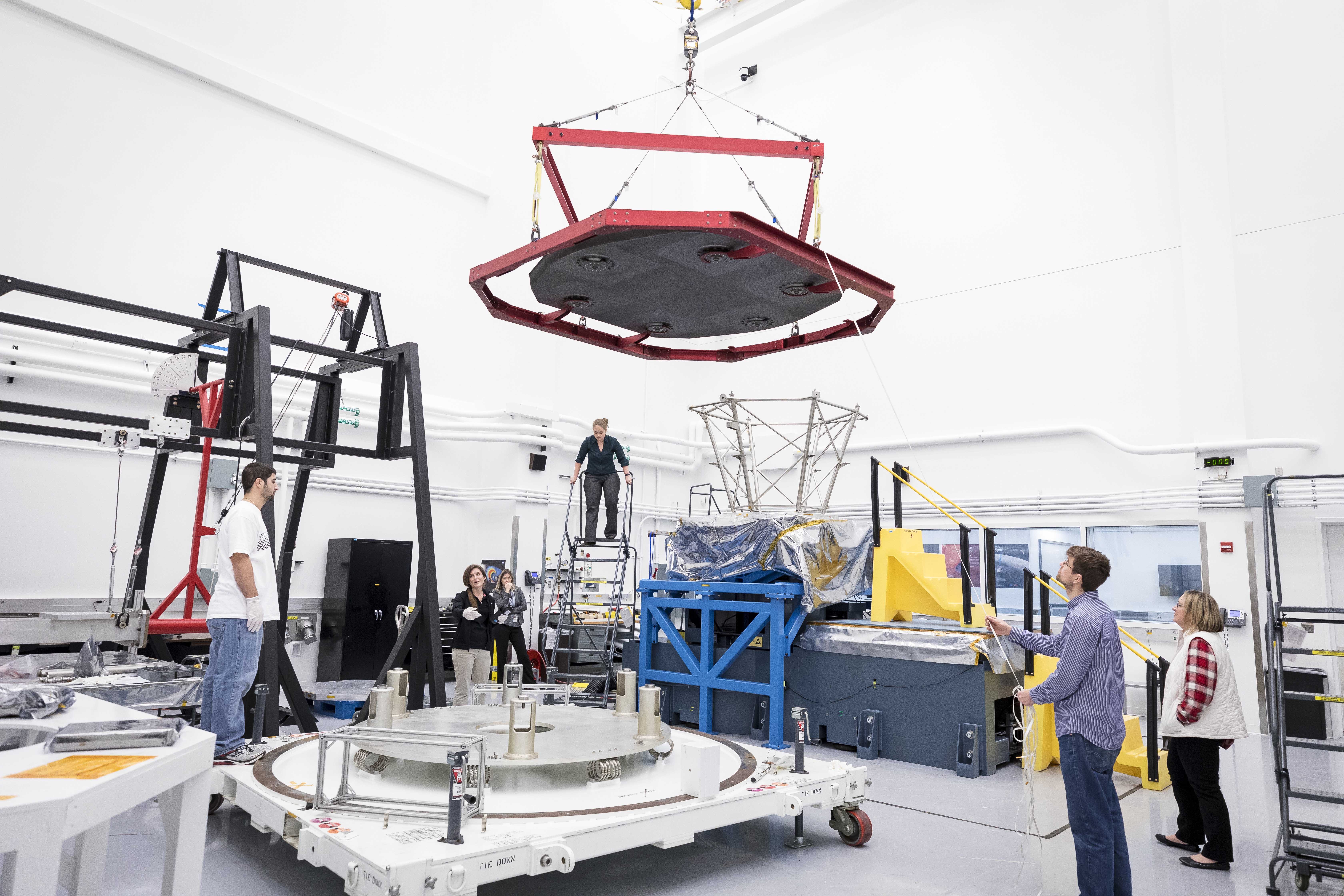 The Parker Solar Probe spacecraft's Thermal Protection System (TPS), or heat shield, is carefully moved to a shipping container for transport from Johns Hopkins APL to NASA's Goddard Space Flight Center and further environmental testing.